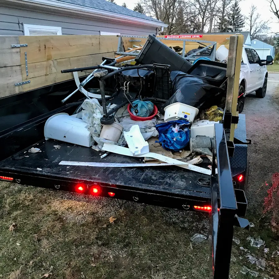 Roll-off dumpster delivered to a residential driveway in Marrero